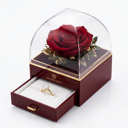 صندوق الوردة الأبدية العنابي الفاخر ELEGANCE ROSES من كنوز مصر - وردة عنابي عميقة محفوظة مع أوراق ذهبية لامعة وزهور مجففة داخل قبة زجاجية كريستالية - صندوق عنابي (بورجوندي) بنقش ELEGANCE ROSES ذهبي ورسمة وردة محفورة بالليزر - درج عنابي مبطن بالمخمل الأبيض مع مقبض ذهبي معدني - خاتم ألماس فاخر داخل الدرج - هدية ذكرى زواج ملكية
